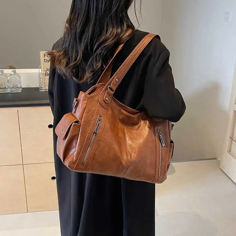 Sacs à bandoulière à compartiment intérieur souple 2024 de haute qualité aux couleurs contrastées pour femmes Mode Fermeture éclair Pu Femmes_voghion.com