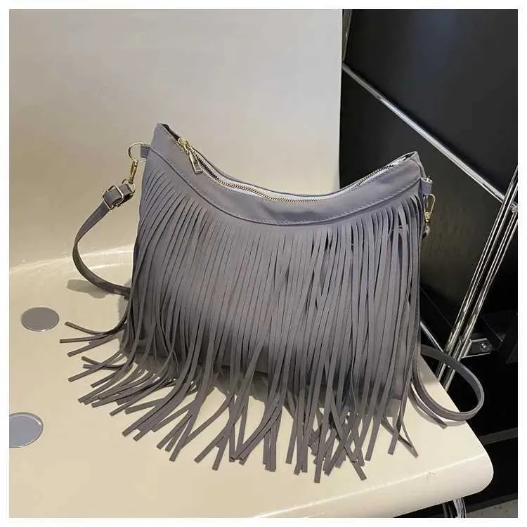Sacs à bandoulière à pompons vintage pour femmes, grande capacité, sac à bandoulière décontracté à franges pour les voyages en plein air pour dames_voghion.com